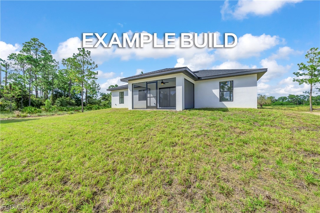 7602 18th Place LaBelle, FL 33935 - Photo 28 of 30 a view of a house with a yard