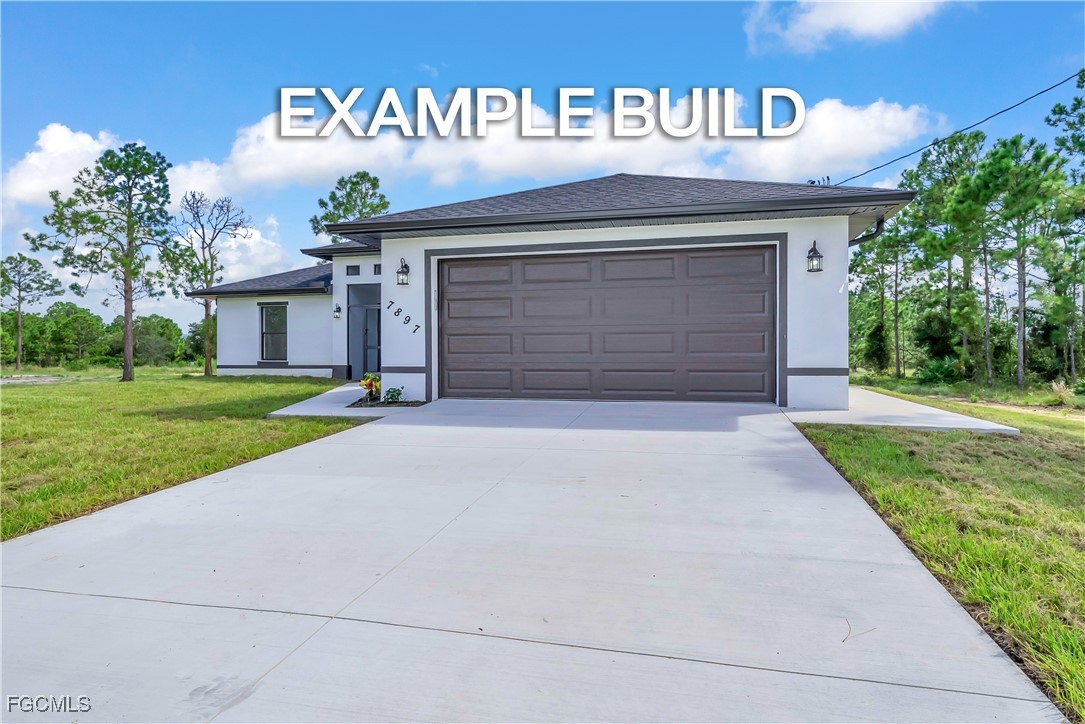 7602 18th Place LaBelle, FL 33935 - Photo 3 of 30 a front view of a house with a yard and garage