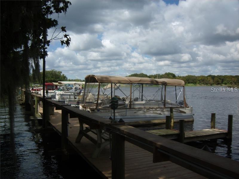 205 Sher Lane DeBary, FL 32713 - Photo 4 of 15 a view of a balcony with two chairs and a table