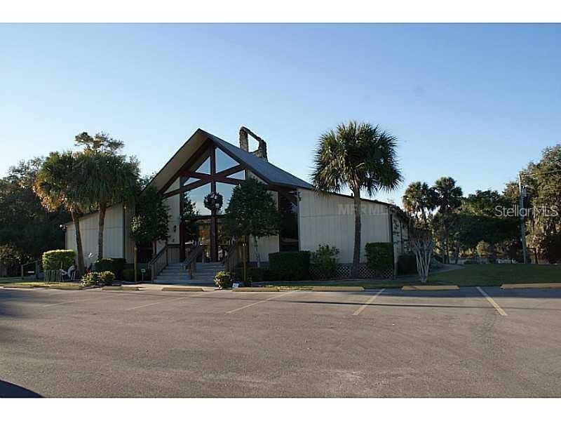 205 Sher Lane DeBary, FL 32713 - Photo 6 of 15 a front view of a house with a yard