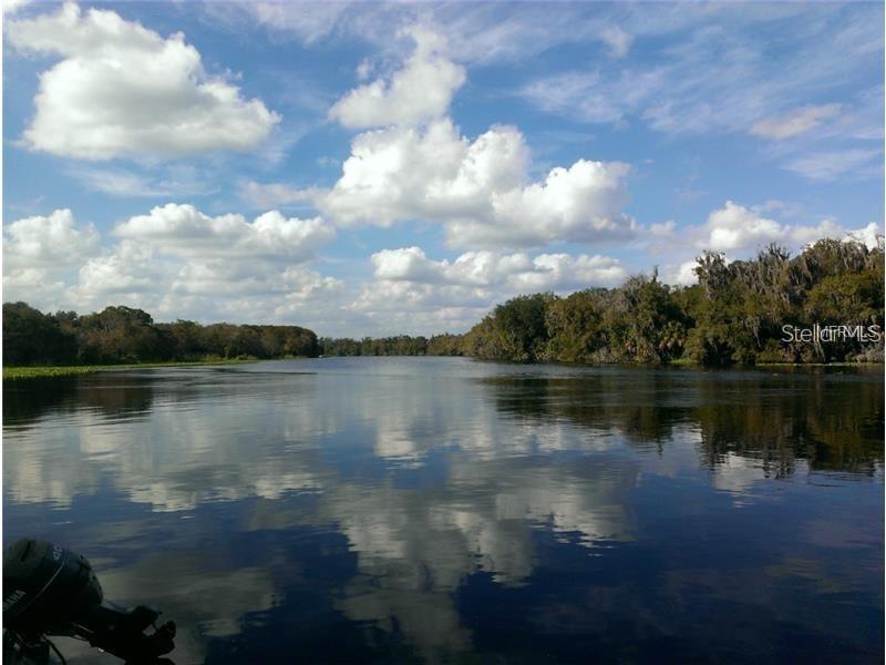 205 Sher Lane DeBary, FL 32713 - Photo 9 of 15 a view of a lake