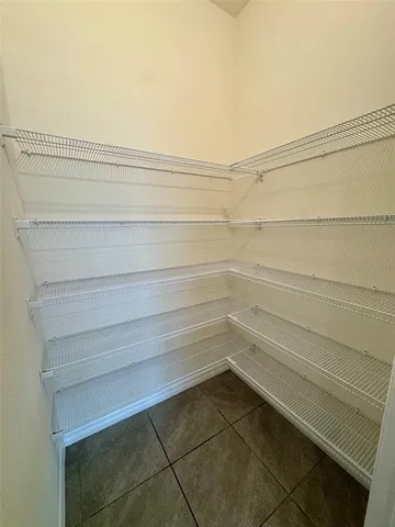 a view of a kitchen with a sink and a dishwasher in a kitchen