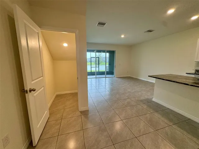 a view of a living room and dining room