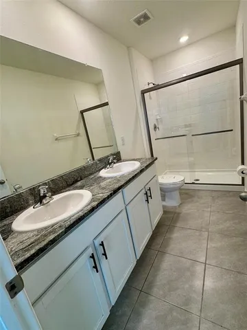 a view of room with wooden floor