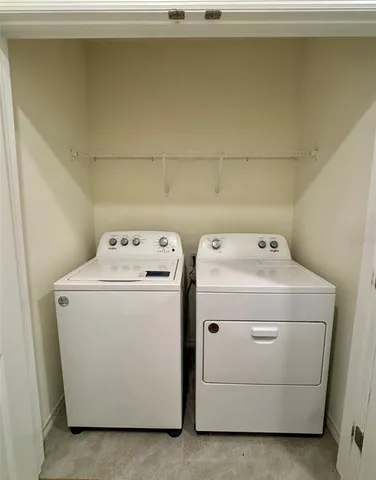 a bathroom with a shower and a toilet