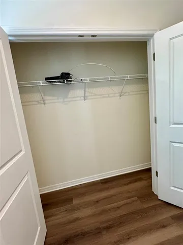 a view of small space with racks on the wall