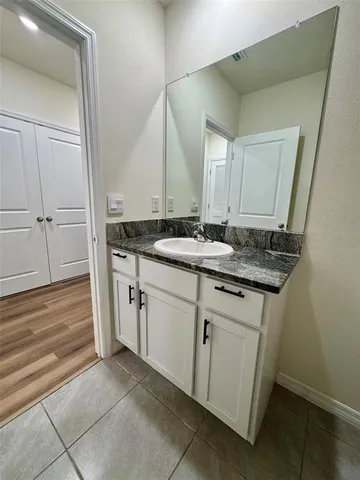 a swimming pool with lots of green space and fog