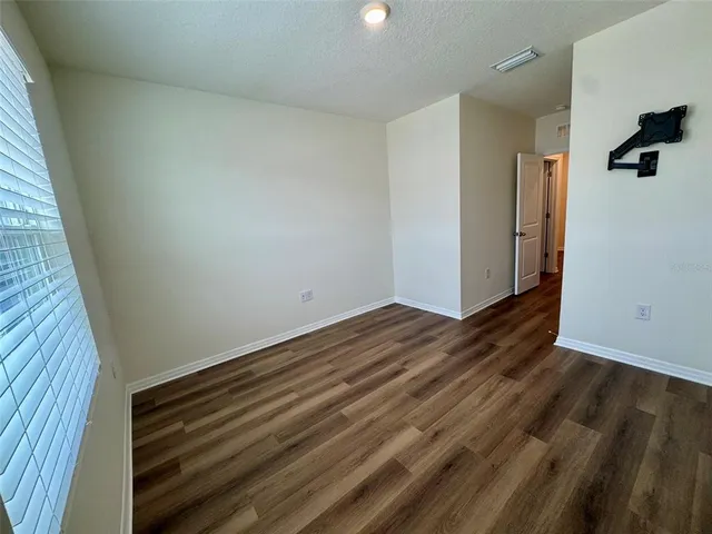 a view of a room next to a yard