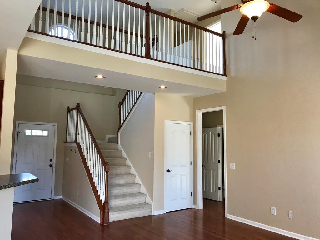 118 Ruland Circle Hendersonville, TN 37075 - Photo 11 of 30 a view of staircase with white walls and a window