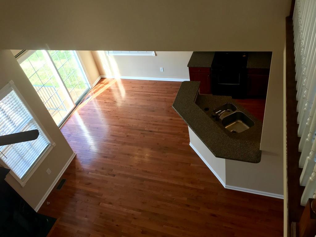 118 Ruland Circle Hendersonville, TN 37075 - Photo 19 of 30 a view of living room with wooden floor and floor to ceiling window