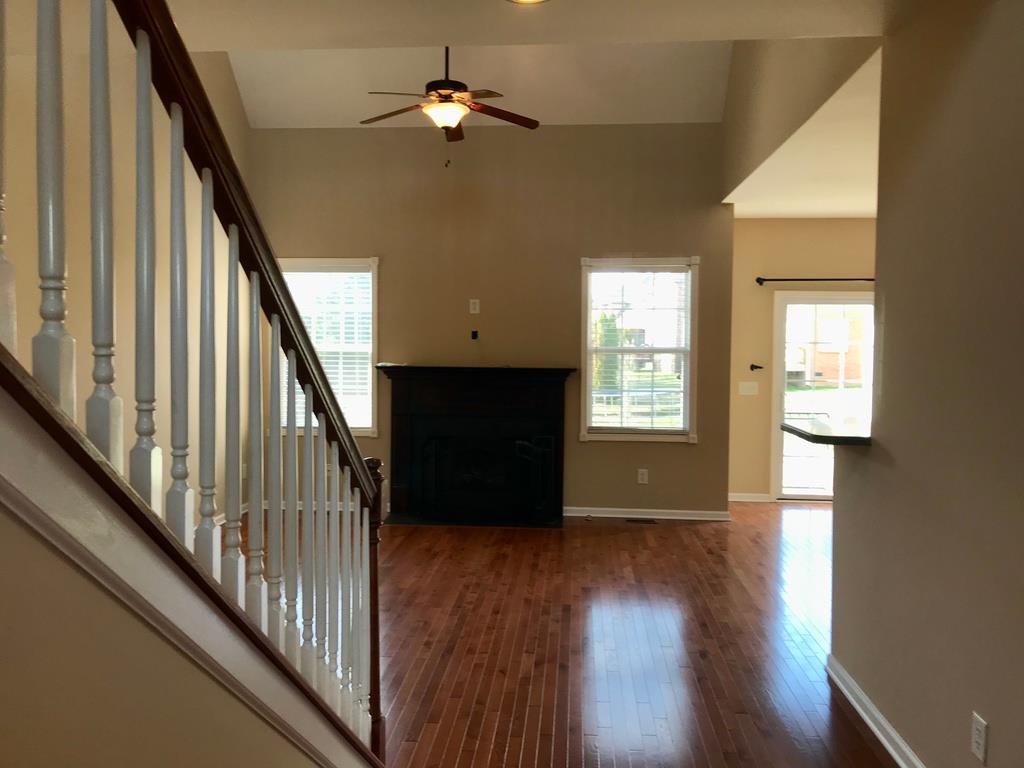 118 Ruland Circle Hendersonville, TN 37075 - Photo 9 of 30 a view of empty room with wooden floor and fan