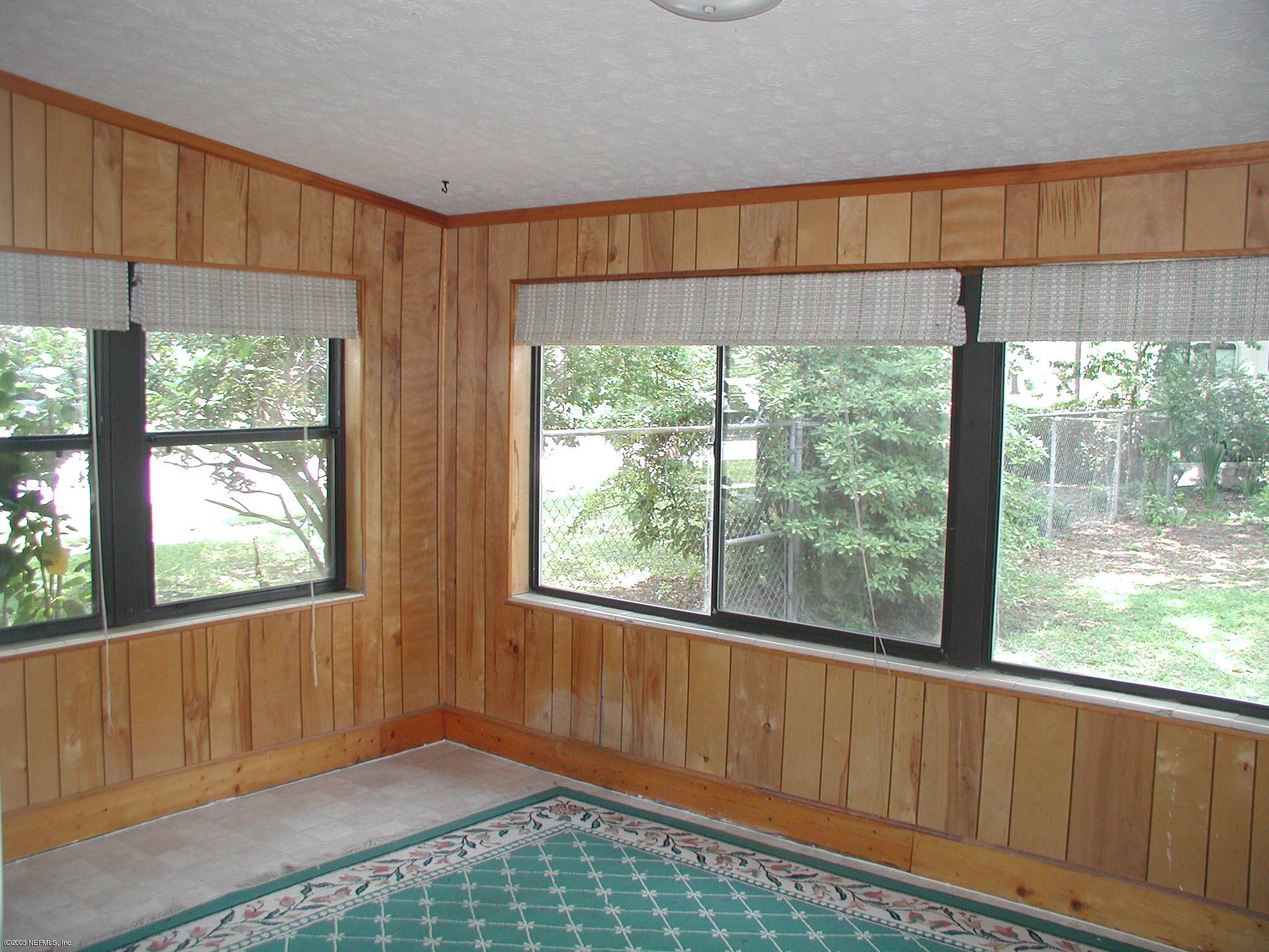 4450 Vinton Road Jacksonville, FL 32207 - Photo 3 of 5 a view of an empty room with a window