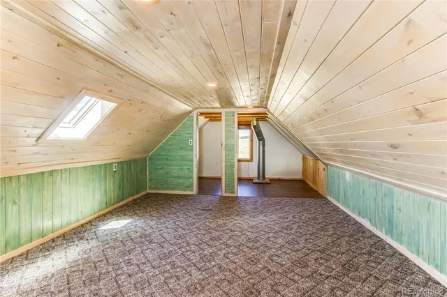 a view of a house with small yard