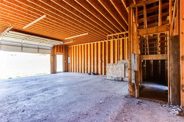 a bench sitting in the middle of a field
