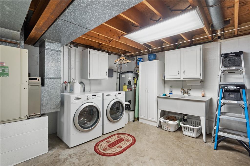 317 Madison Heights Road Madison, PA 15672 - Photo 25 of 32 a utility room with dryer and washer