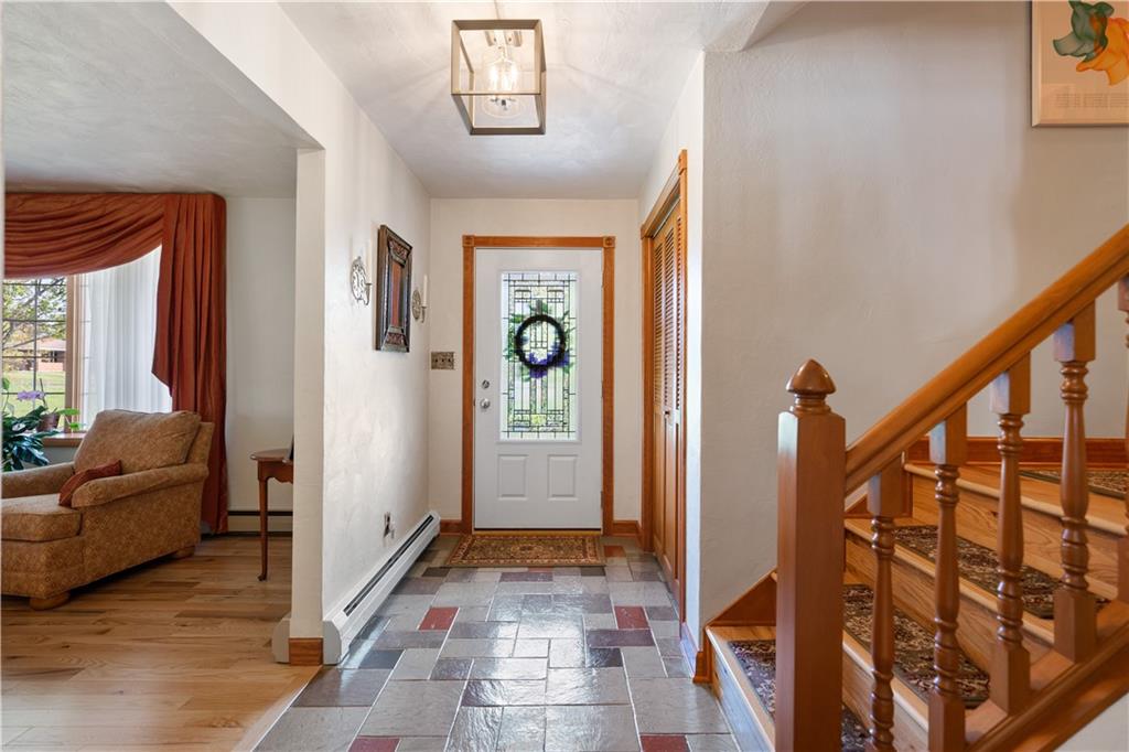 317 Madison Heights Road Madison, PA 15672 - Photo 5 of 32 a view of a hallway with furniture and windows