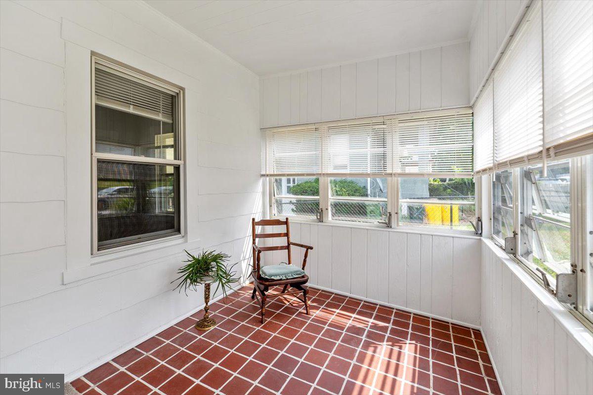 122 West Hilltop Road Baltimore, MD 21225 - Photo 14 of 32 Enclosed front porch