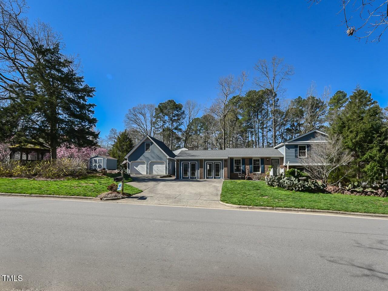 310 Electra Drive Cary, NC 27513 - Photo 2 of 45 a view of house with outdoor space and street