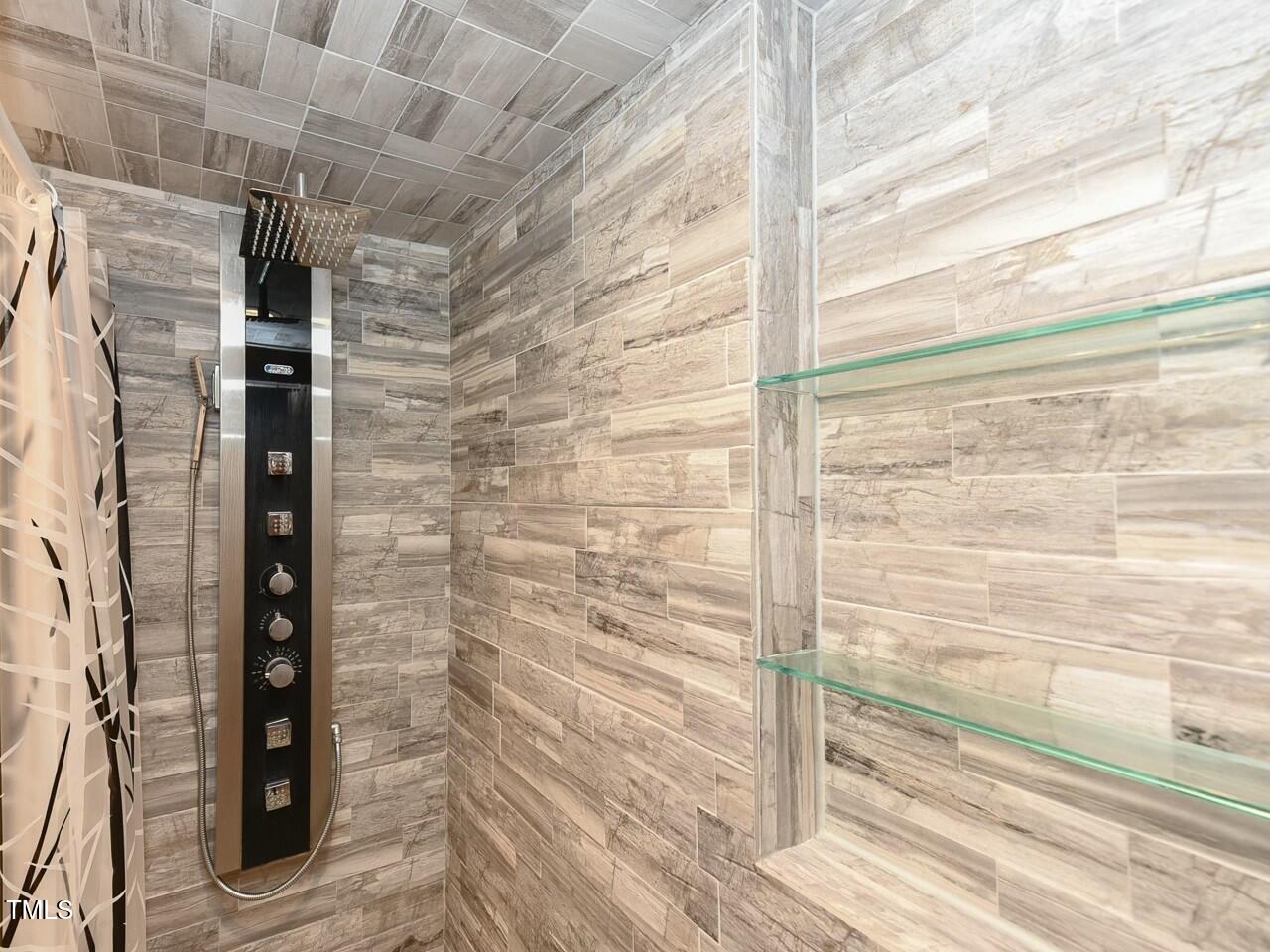 310 Electra Drive Cary, NC 27513 - Photo 22 of 45 a bathroom with a shower