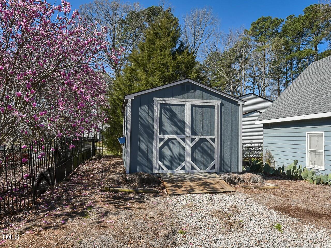 310 Electra Drive Cary, NC 27513 - Photo 40 of 45 a front view of a house with garden