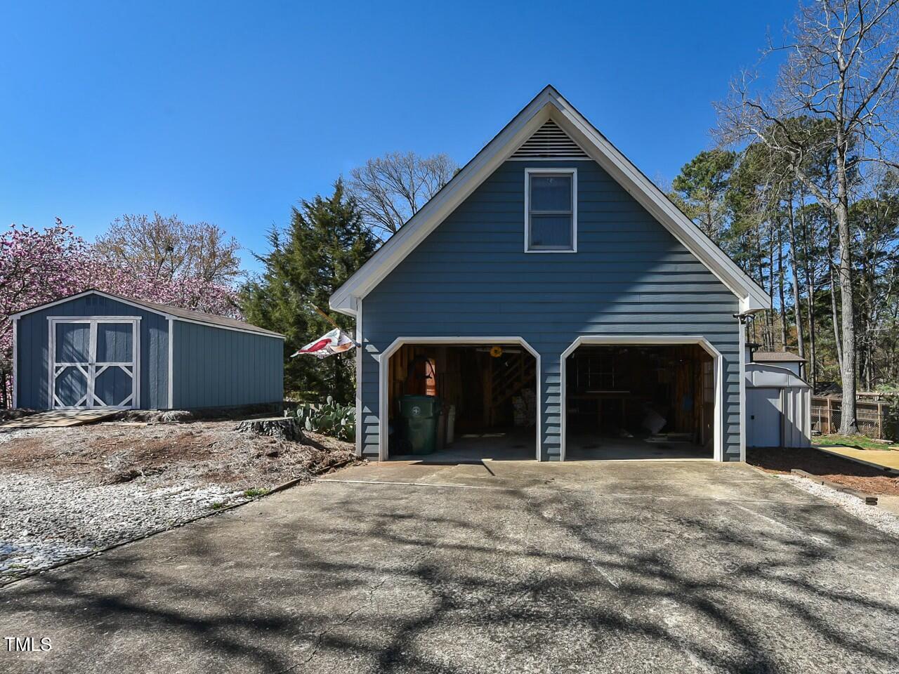 310 Electra Drive Cary, NC 27513 - Photo 42 of 45 a view of a house with large yard and large trees