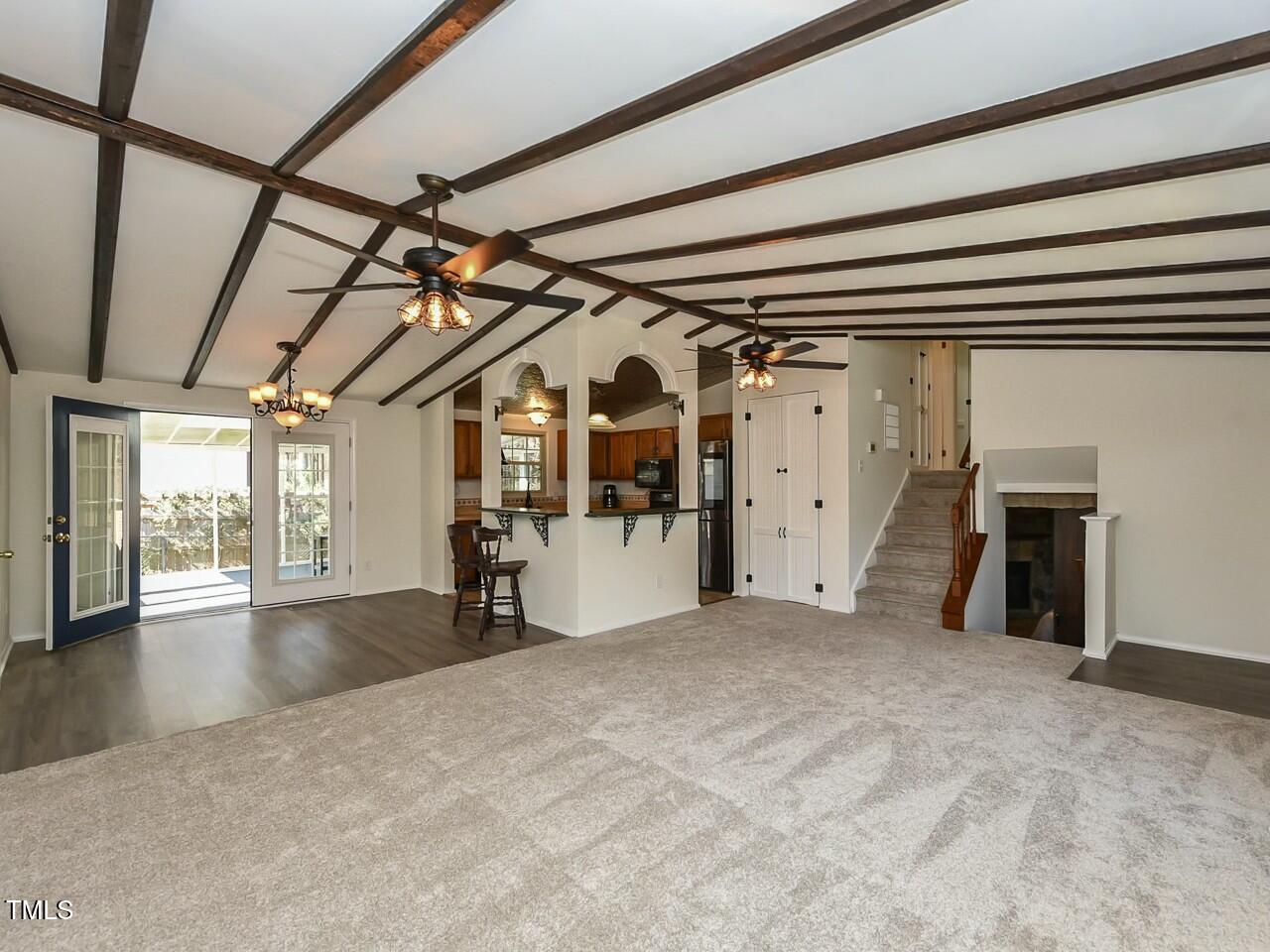310 Electra Drive Cary, NC 27513 - Photo 8 of 45 a view of a big room with wooden walls