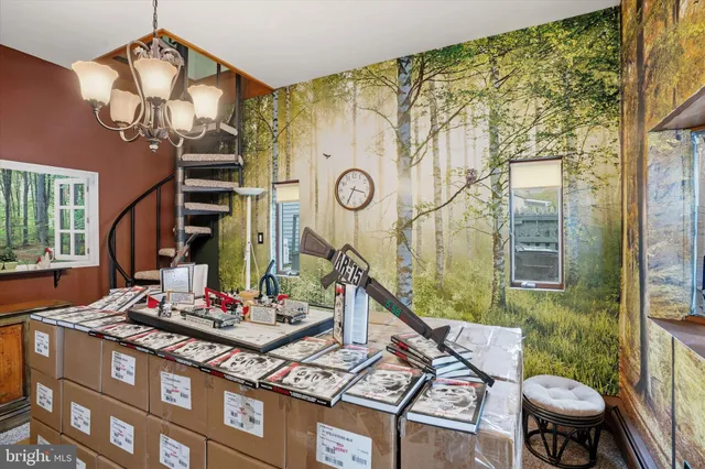 a view of entryway with furniture and stairs
