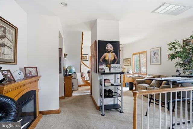 a work room with furniture and a window