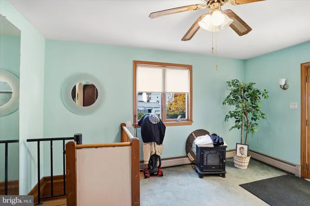 a bathroom with a sink mirror and vanity