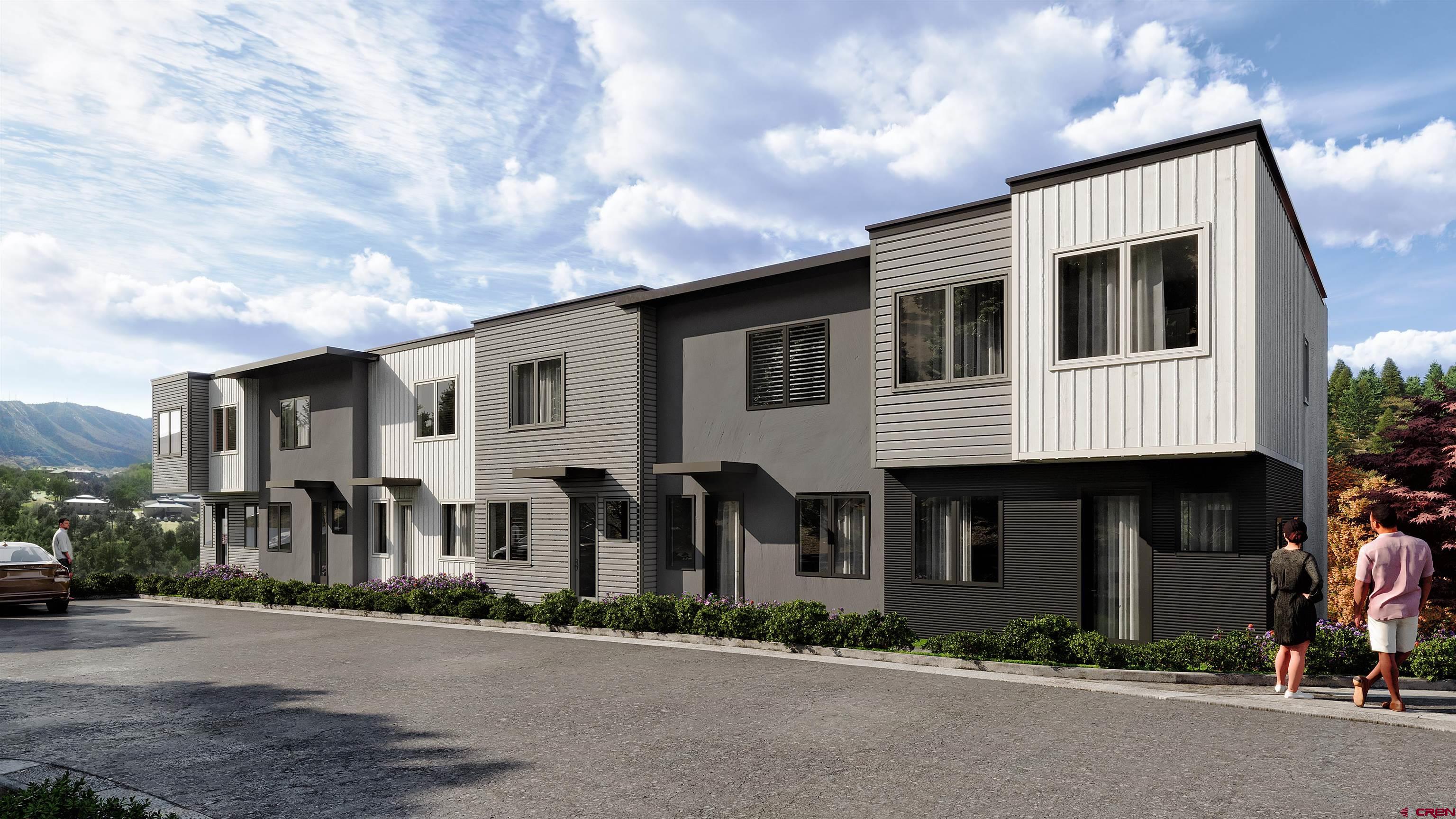 762 Goeglein Gulch Road, Unit 5 Durango, CO 81301 - Photo 30 of 43 a front view of a house with a yard