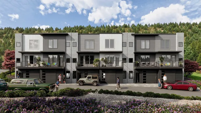 an aerial view of a house with a yard basket ball court and outdoor seating