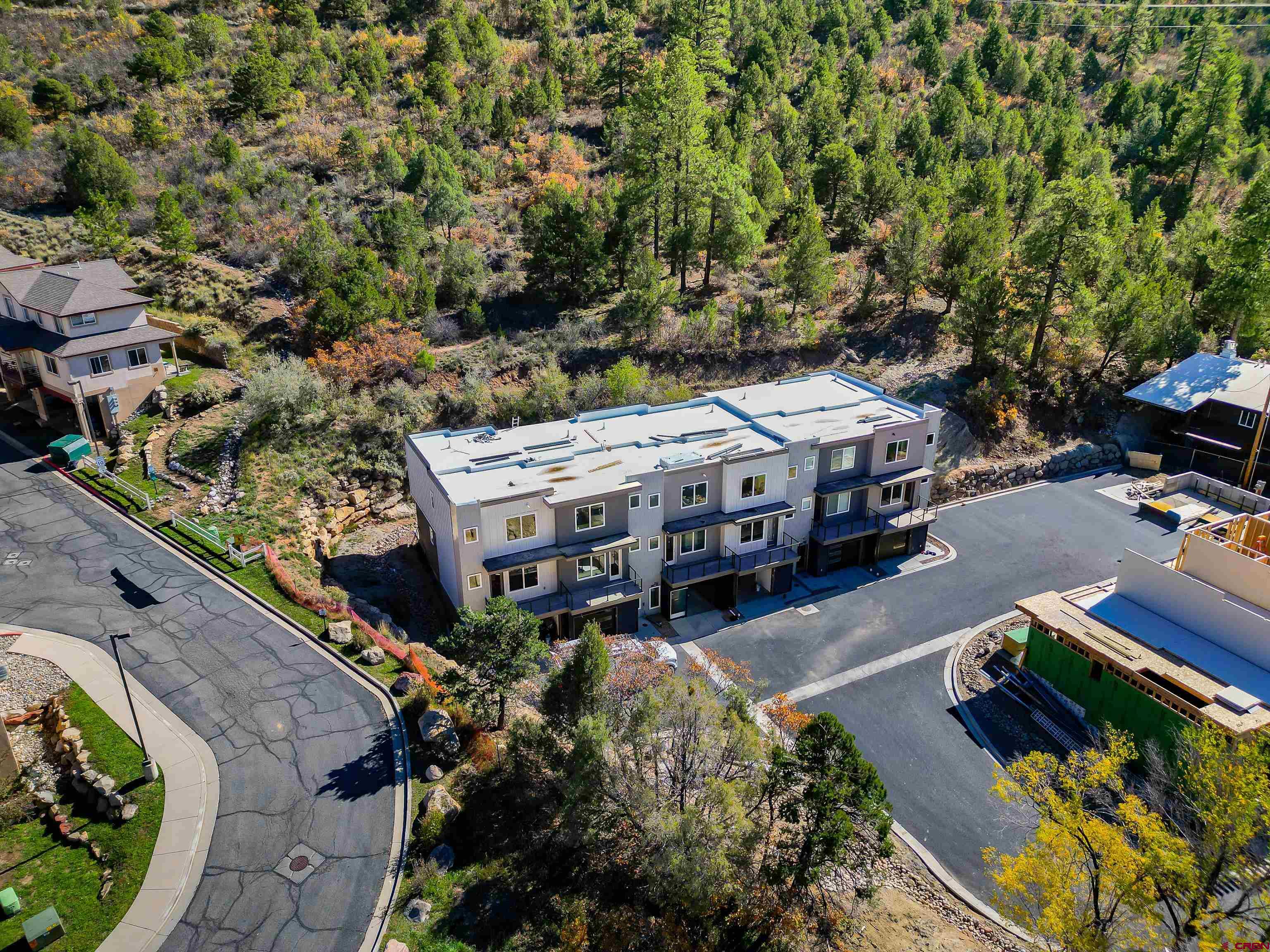 762 Goeglein Gulch Road, Unit 5 Durango, CO 81301 - Photo 36 of 43 an aerial view of a house with a yard basket ball court and outdoor seating