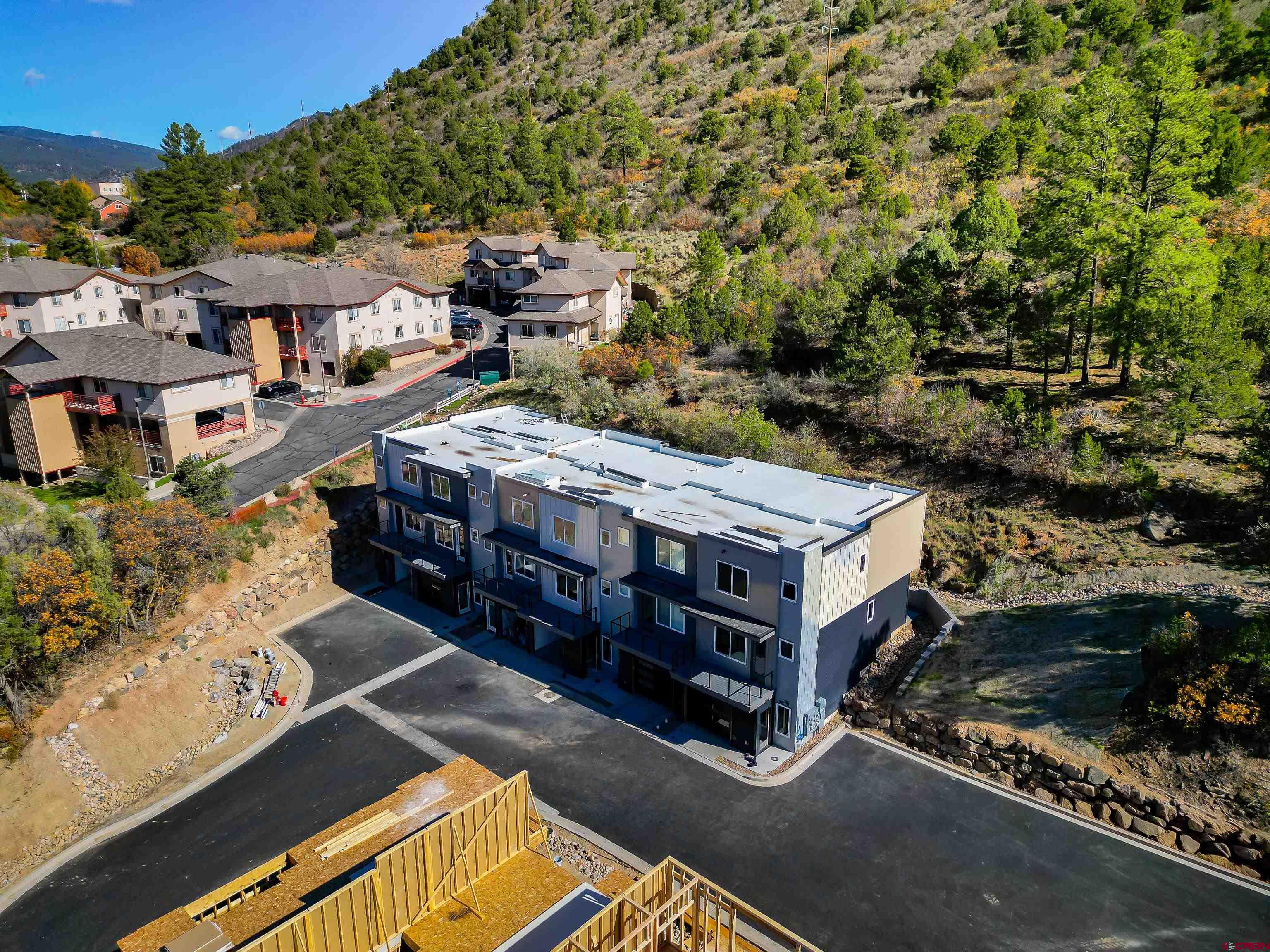 762 Goeglein Gulch Road, Unit 5 Durango, CO 81301 - Photo 37 of 43 an aerial view of residential houses with yard