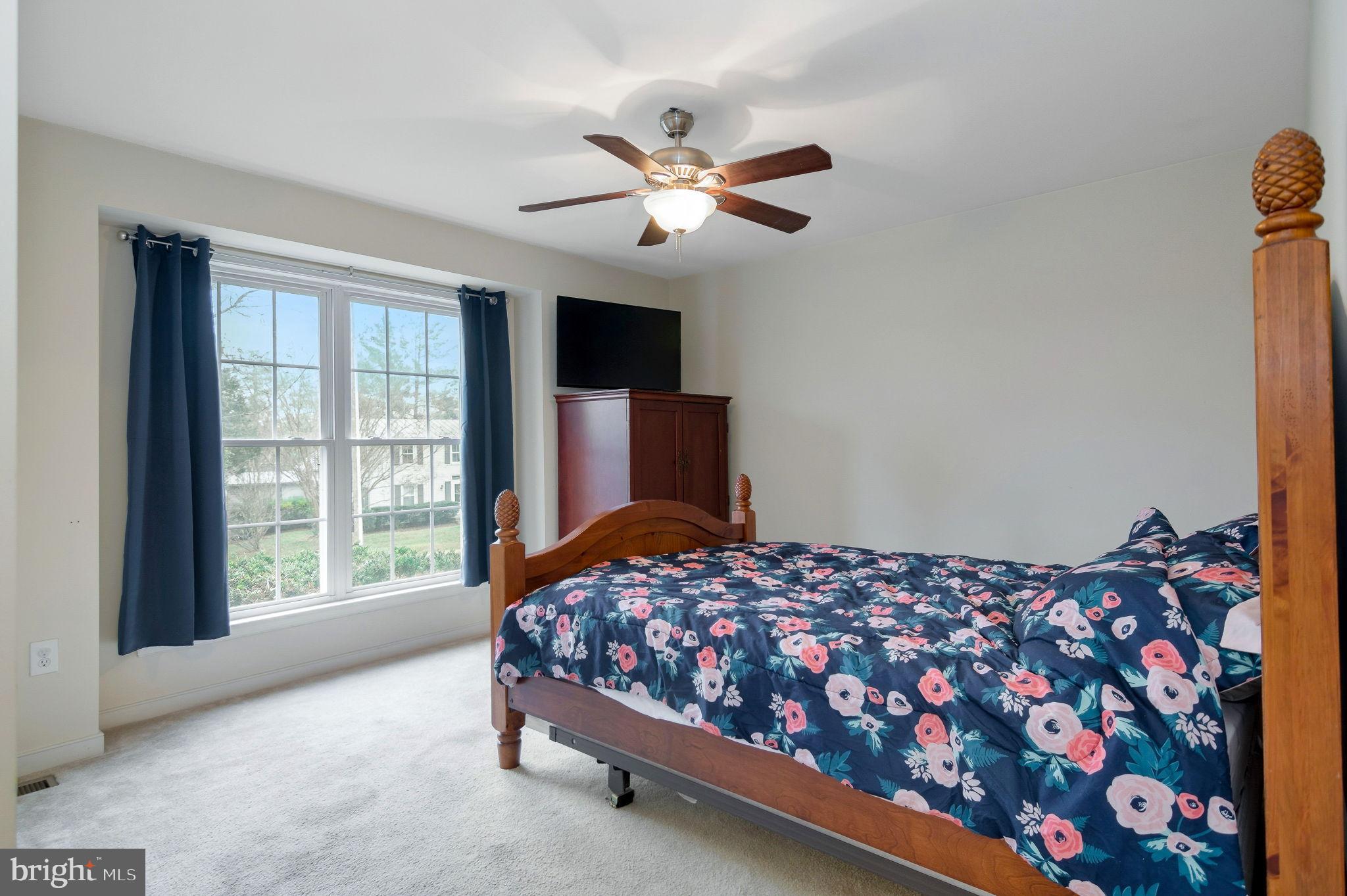 405 Harrison Circle Locust Grove, VA 22508 - Photo 23 of 33 a bedroom with a bed and a window