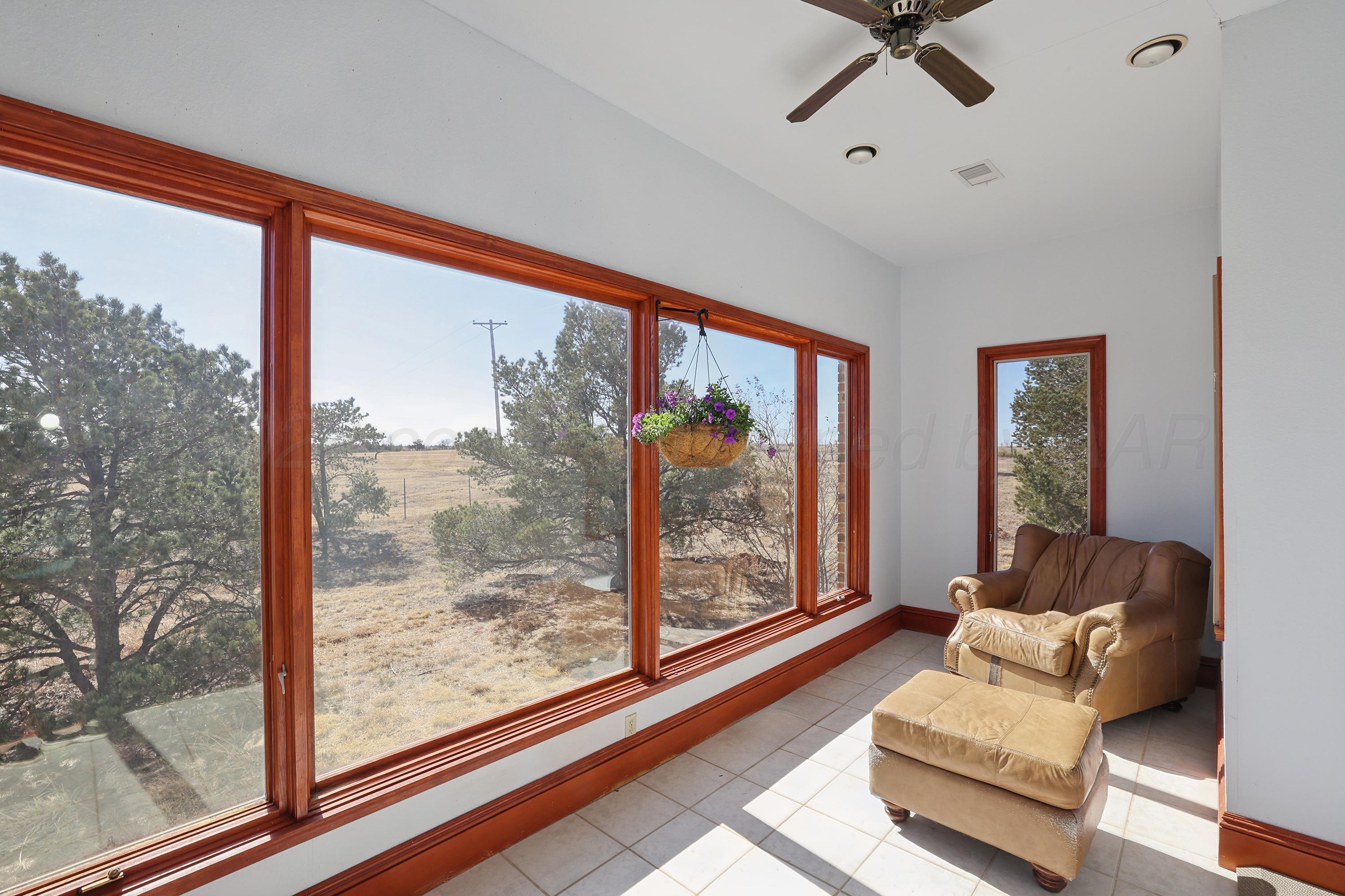 500 North Girl Scout Road Amarillo, TX 79124 - Photo 12 of 52 19-Sunroom off Primary Bedroom