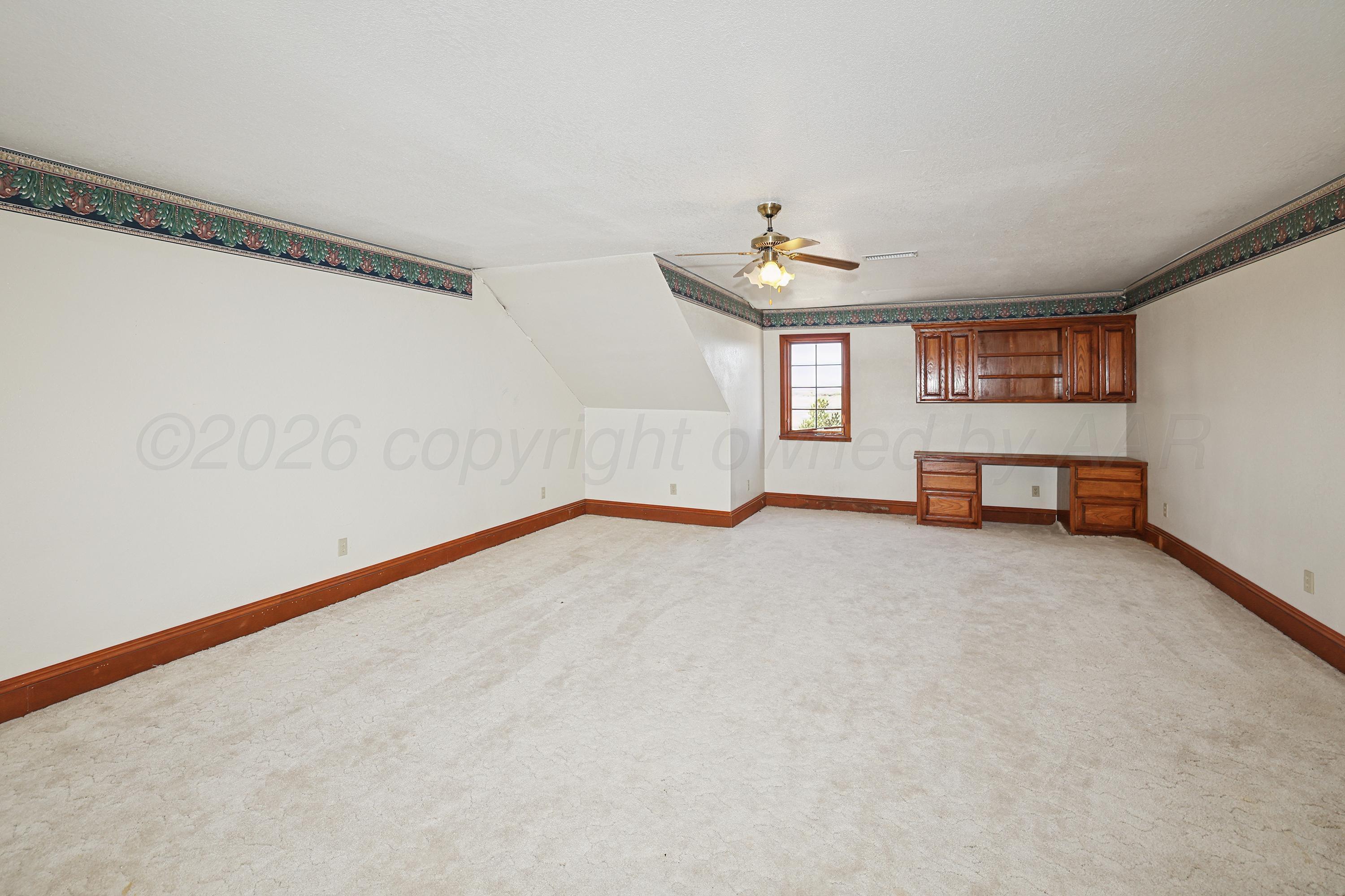 500 North Girl Scout Road Amarillo, TX 79124 - Photo 27 of 42 a view of an empty room with a window