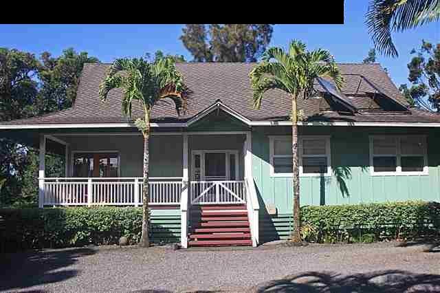 2575 Ala Olu Place Haiku, HI 96708 - Photo 1 of 11 a front view of a house with a yard and potted plants