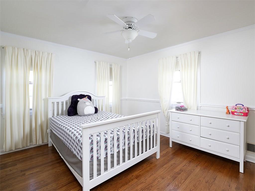 534 Harrogate Road Upper St. Clair, PA 15241 - Photo 18 of 25 Third bedroom with two closets, freshly painted and hard wood flooring plus lots of natural light from the windows.