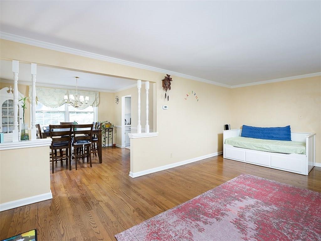 534 Harrogate Road Upper St. Clair, PA 15241 - Photo 7 of 25 Living Room with ample natural lighting, crown molding and hardwood flooring.