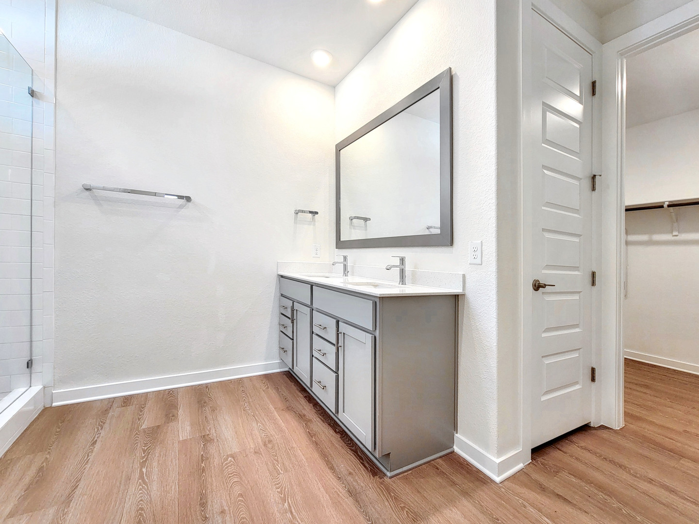2329 Gabriels Horn Road Leander, TX 78641 - Photo 12 of 23 Double vanity with contemporary finishes, ample storage, and a separate walk-in shower elevate daily routines.