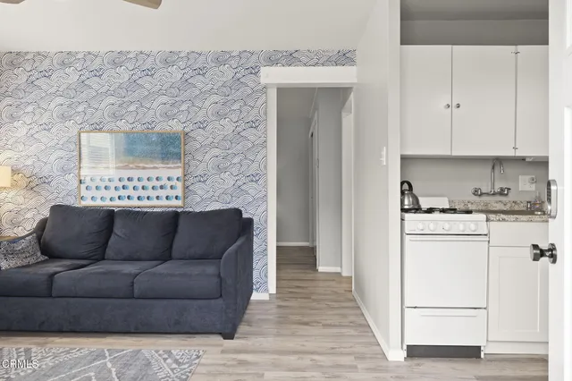 a front view of a house with a large window