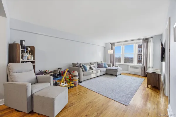 a living room with furniture and a window