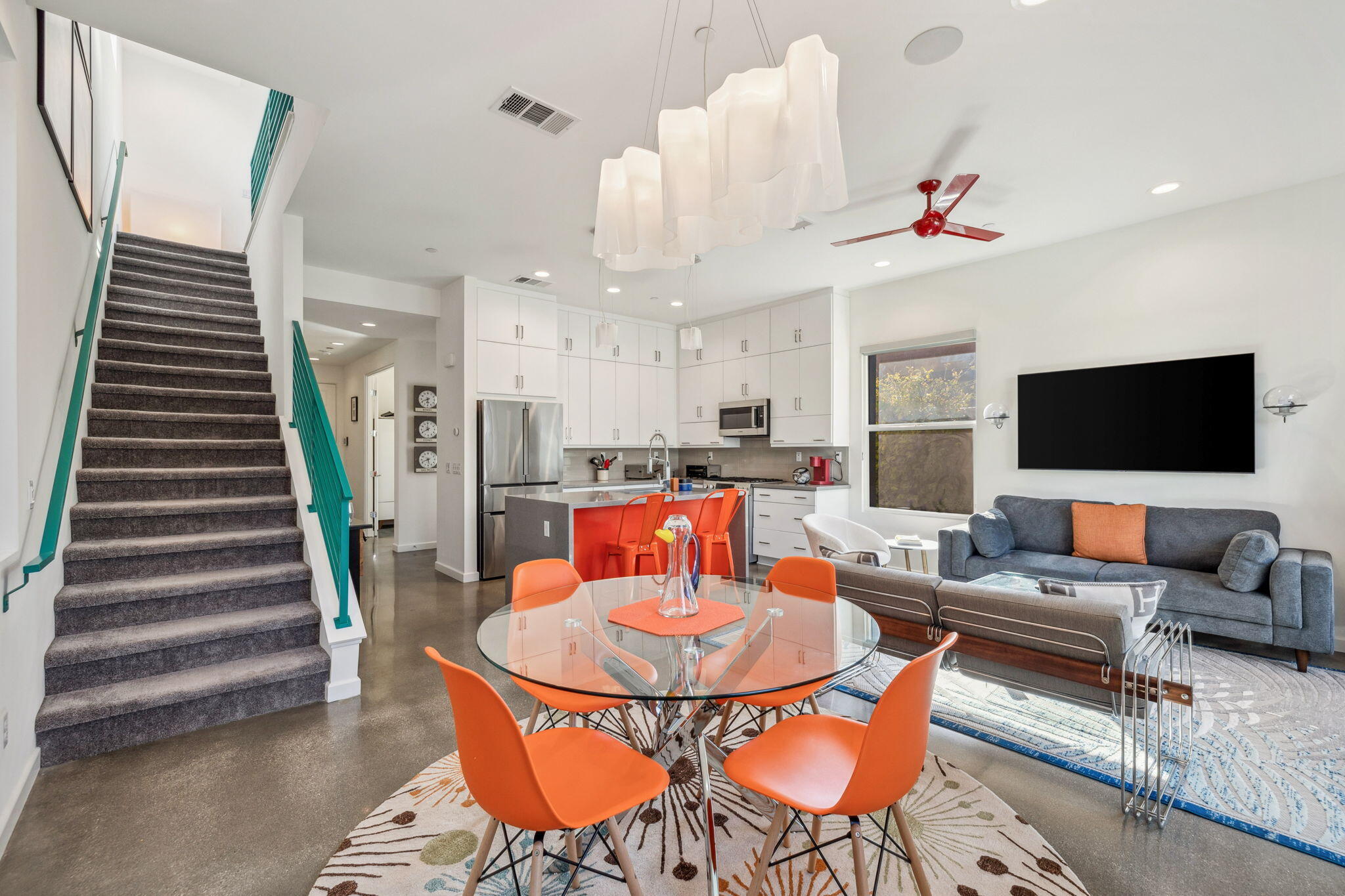 2691 Paragon Loop Palm Springs, CA 92262 - Photo 12 of 18 a living room with furniture kitchen view and a flat screen tv