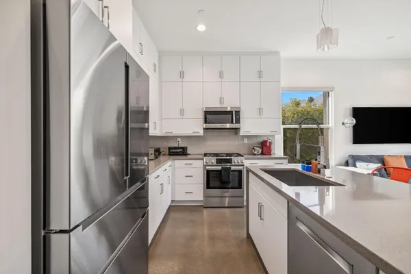 a view of a balcony with chairs