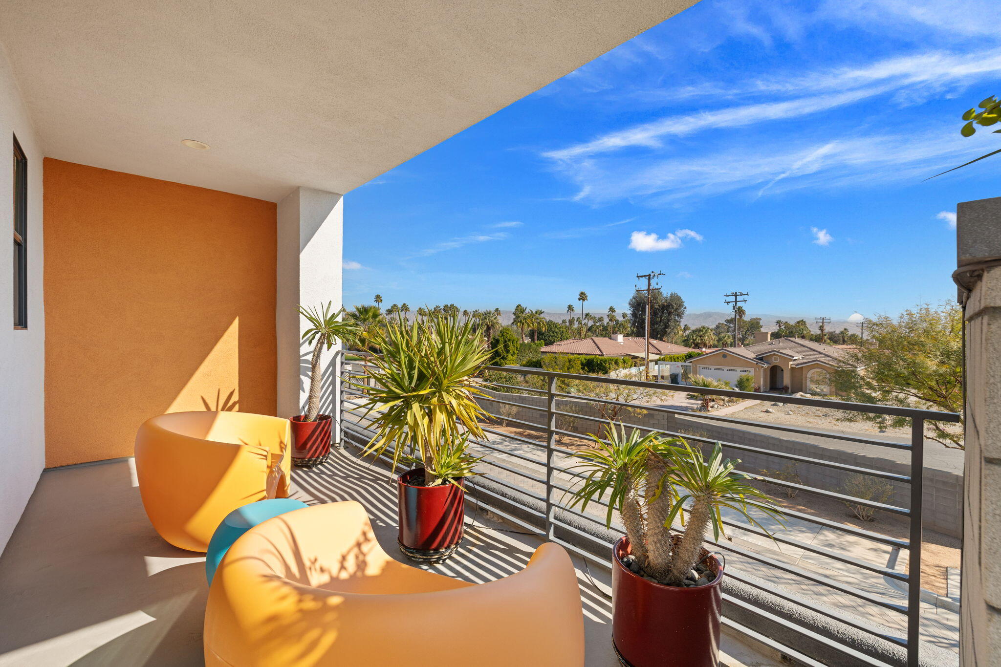 2691 Paragon Loop Palm Springs, CA 92262 - Photo 16 of 18 a view of a balcony with chairs
