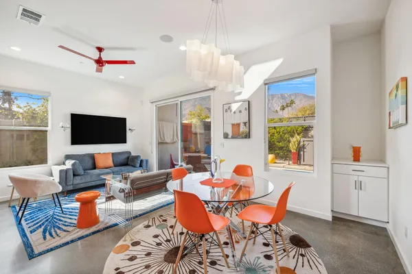 a view of a hallway with seating area