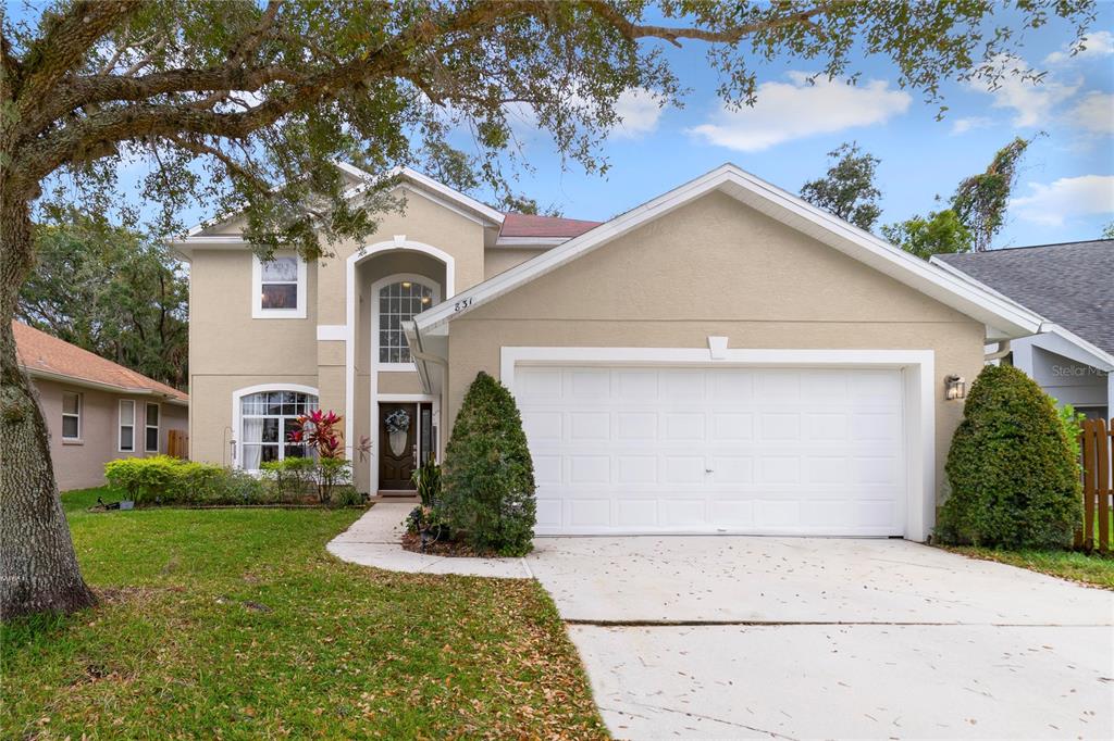 Welcome to Bridge Water in 32828 and this 4-bedroom, 2.5-bath home with an UPDATED ROOF, A/C and WATER HEATER, recent INTERIOR and EXTERIOR PAINT a REMODELED KITCHEN & BATHS and a private backyard with CONSERVATION VIEWS!