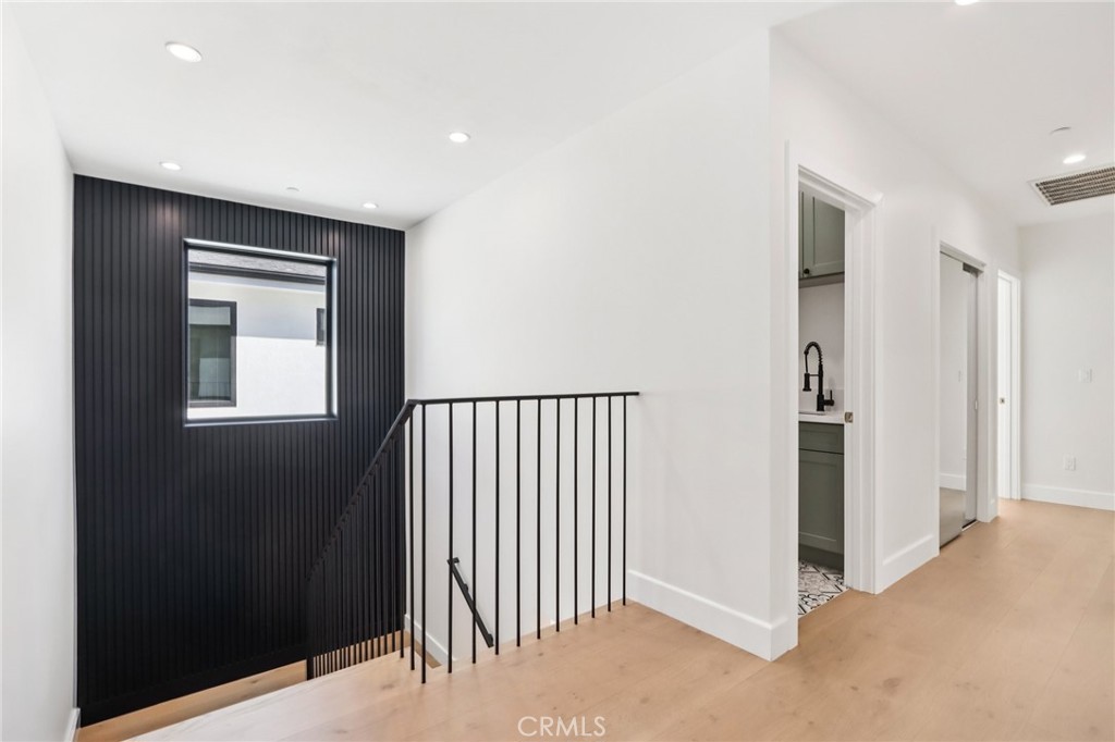 14931 Vose Street Van Nuys, CA 91405 - Photo 18 of 51 a view of a hallway with windows and entryway