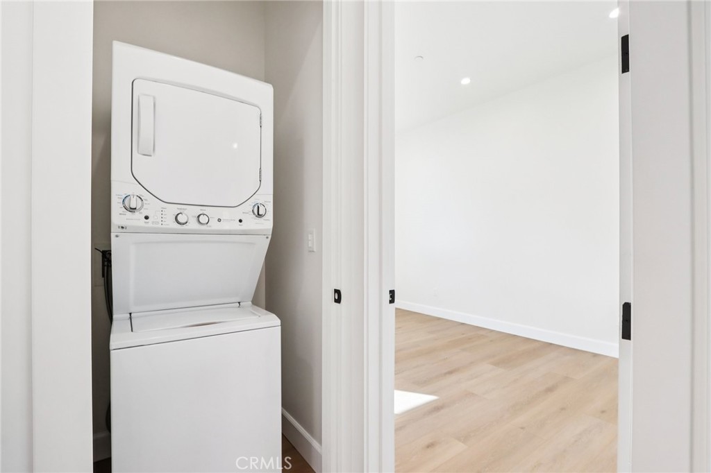 14931 Vose Street Van Nuys, CA 91405 - Photo 42 of 51 a view of bathroom with a washer and dryer