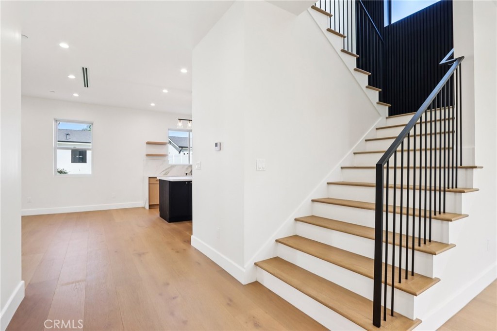 14931 Vose Street Van Nuys, CA 91405 - Photo 9 of 51 a view of entryway and hall with wooden floor